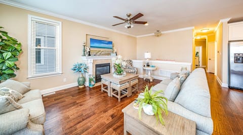 This cozy living room invites you to relax in beachy elegance