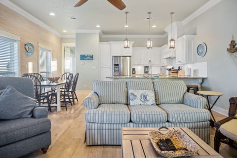 Beach Breeze Living Area: Entertain with ease in the expansive living areas, where every detail exudes luxury and sophistication.