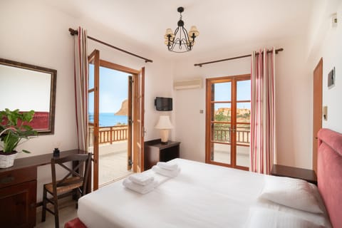 Comfort Studio, Balcony, Sea View | Individually decorated, desk, laptop workspace, iron/ironing board