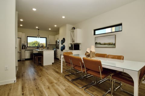 CB2 dining table can seat 8-10.