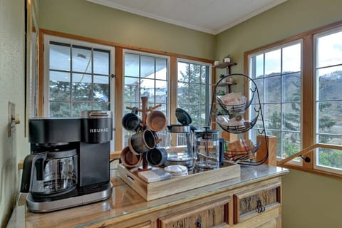 Coffee station including a Keurig Duo, Electric Kettle, French press, k-cups and loose ground coffee, tea assortment, treats and snacks.