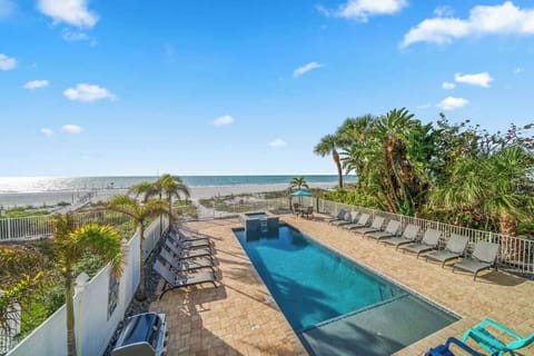 Heated Pool & Spa with Ample Space to Relax in the Sun... Located Just Steps Away from the White Sands and Crystal-Clear Waters