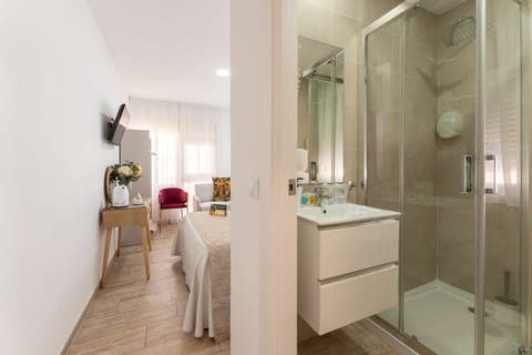 Double Room | Bathroom | Shower, towels, soap, shampoo