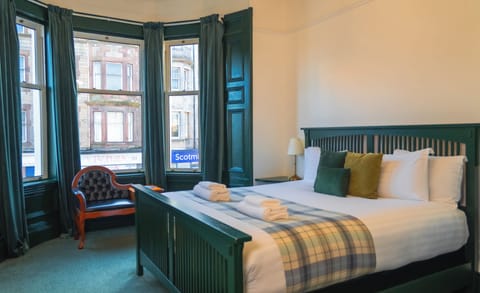 Deluxe Double Room | Desk, blackout drapes, iron/ironing board, free WiFi