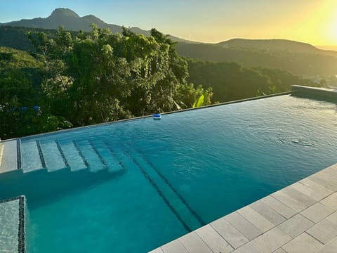 Blue Waters Pool with Sea and Mountain View (1)