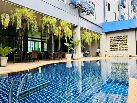 Outdoor pool, open 7:00 AM to 8:00 PM, sun loungers