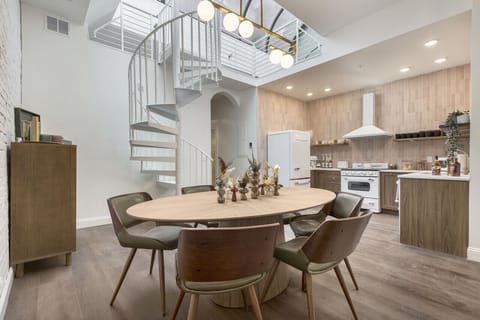 Step back in time to mid-century grandeur. This suite takes you back. Custom kitchen, record player, 85` Smart TV with free Wi-Fi, this great room has it all!
