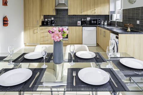 Bright and cozy dining space designed for memorable meals and quality time.
