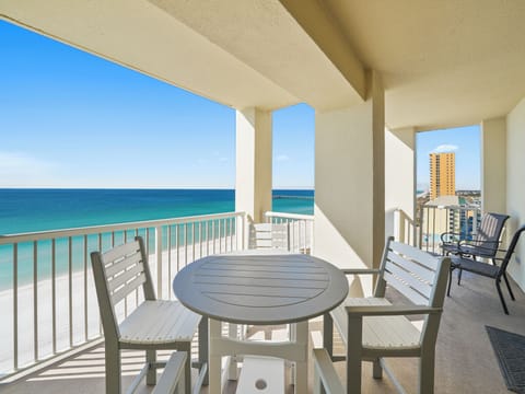 Your private balcony with stunning ocean views and outdoor dining - perfect for morning coffee or sunset cocktails.