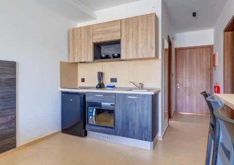 Shared kitchen for both room