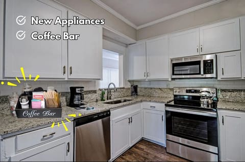 Savor the convenience of modernity in our fully-equipped kitchen in our 50s Retro home at Northeast Fondren MS Near Belhaven, where a coffee bar awaits to start your mornings with a refreshing sip.