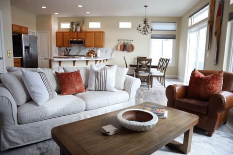 Living room, kitchen, and dining area