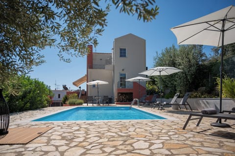 Swimming pool - Property building -  Outdoor area - Sun loungers