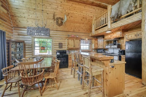 Rustic dining area and kitchen with breakfast bar
