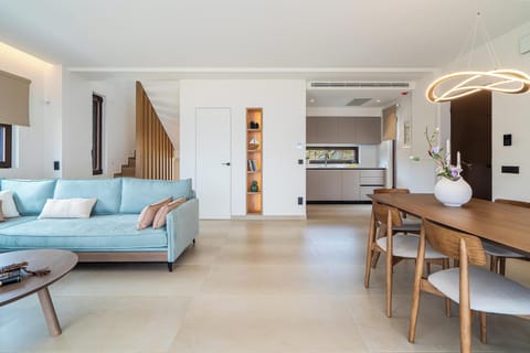 Luxury Villa | Living area | 55-inch Smart TV with satellite channels, fireplace