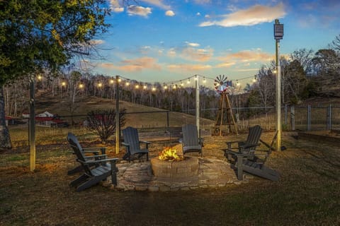 Gather around the Fire Pit in the large, fenced yard