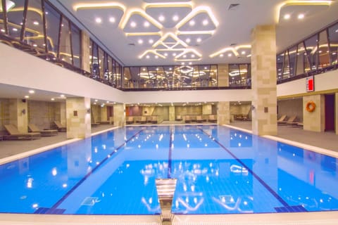 Indoor pool, sun loungers