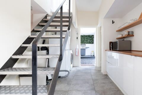Downstairs kitchen-laundry space