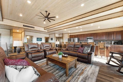 The main living area is open-concept, so everyone can join on the fun, whether in the kitchen or gathered on the couches.