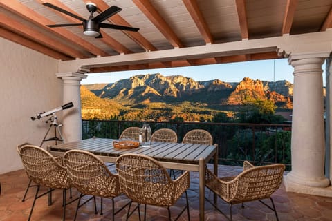 Outdoor Dining off the upper living room with incredible views.