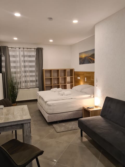 Comfort Double Room | Desk, laptop workspace, blackout drapes, iron/ironing board