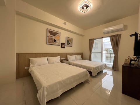 Pillowtop beds, desk, laptop workspace, free WiFi