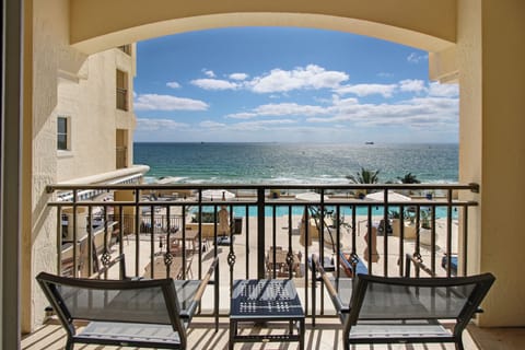 Private balcony with amazing view of the ocean and swimming pool