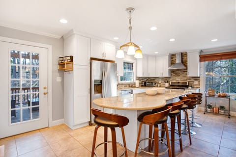 The kitchen with door to the deck