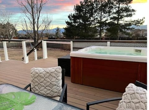 Hot tub w/ Mountain View on two tier deck; large backyard with sand area to play