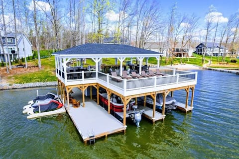 Your family will enjoy our large private lakefront lot with ~300' of waterfront property, a private sandy beach, amazing private 2 story dock and boat house with large comfy lounge area for relaxation!