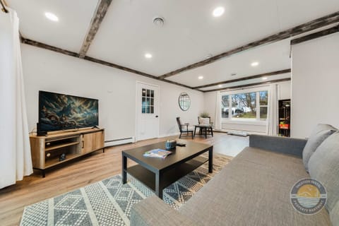 Kick back in this bright, open living room designed for relaxing after a day in Lake Geneva. Stretch out on the comfy seating, put on your favorite show, and enjoy the clean modern feel with plenty of space for everyone to gather and unwind.