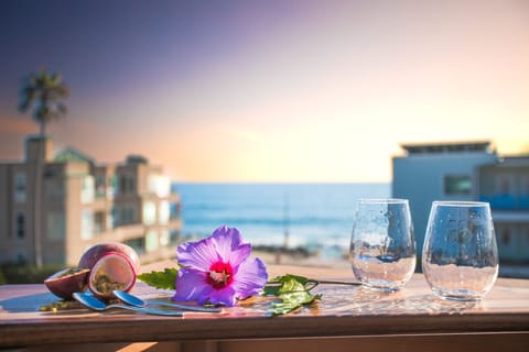 Indulge in blissful relaxation as you soak in the jacuzzi, overlooking the endless expanse of the ocean