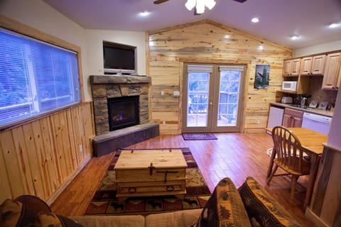 Riverfront Cottage | Premium bedding, pillowtop beds, individually decorated