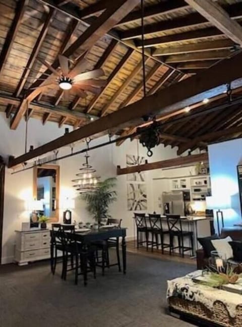 The large open concept gathering area was formerly a hayloft in this 1860 stable