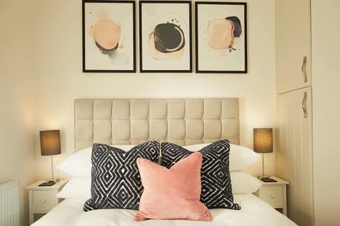 Spacious king-size bed, perfect for a comfortable stay for two.