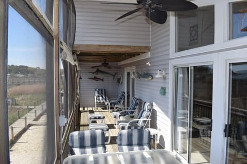 Enjoy amazing views from the screened porch, which spans the entire first level.