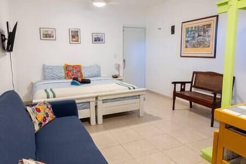 Large studio with queen size bed and sofa. 