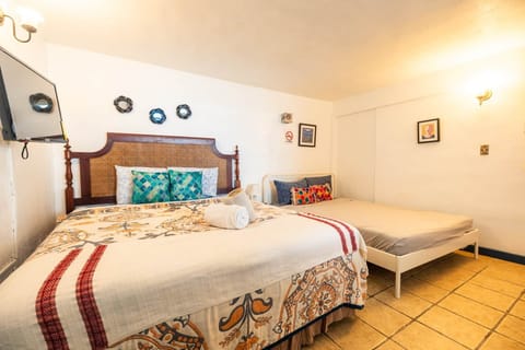 Spacious room with queen and full size bed that fits 4 people.