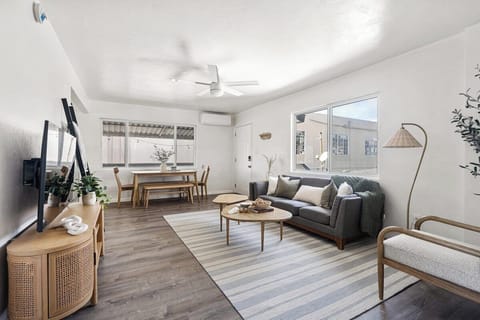 A comfy, cozy Boho inspired room with lots of natural lighting, a brand new Samsung smart tv, and AC/Heat!