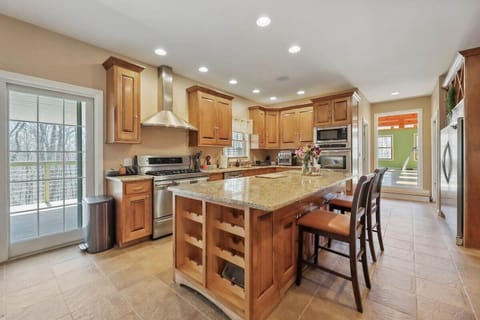 Large kitchen with central island.
