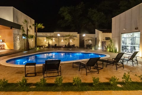 Outdoor pool, pool umbrellas, sun loungers