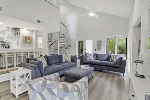 Spacious 2 Bedroom 2nd Floor Condo with a main floor bedroom and guest bedroom up the spiral stairs. Spacious Balcony 