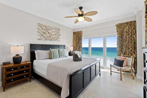 Spacious master suite king bed and ensuite bath and private balcony access.