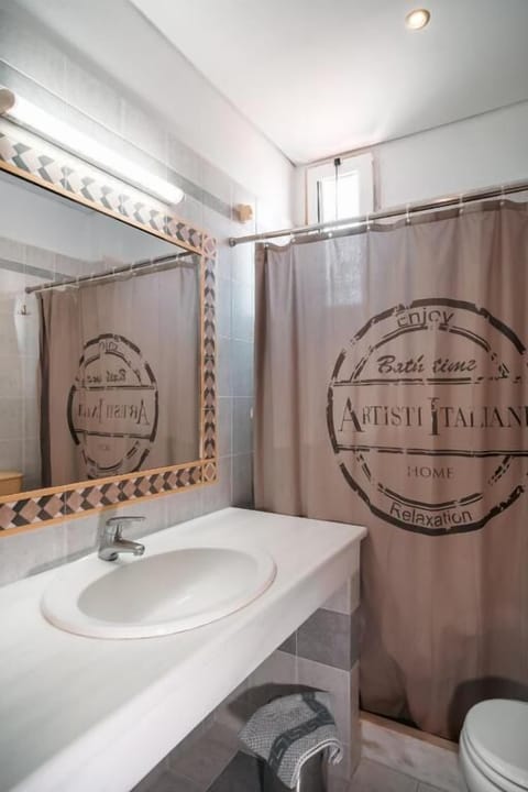 Shower, free toiletries, hair dryer, slippers