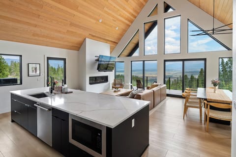 Mountain Views for miles from open living room in new modern home