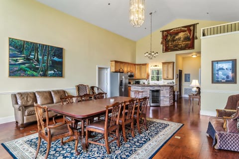Oversized dining table near the kitchen—perfect for meals, games, and chats.