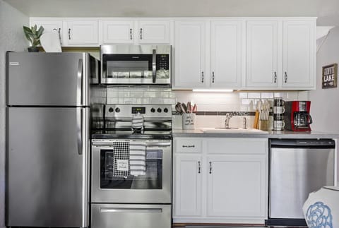 Get inspired to cook and entertain in the stylish and fully equipped kitchen, complete with all the modern amenities you need to whip up a delicious meal