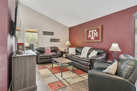 Ample seating in the living room ensures comfort and social ease.