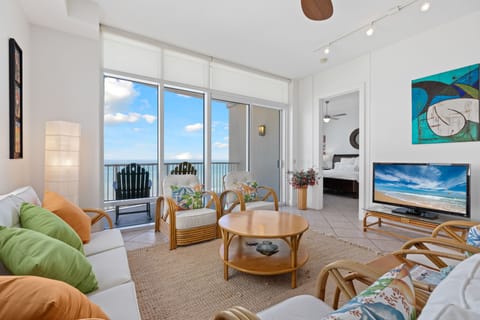 Living Area surrounds a flat screen TV with beautiful views to the ocean!