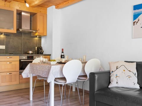 Cabinetry, Furniture, Property, Countertop, Table, White, Chair, Interior Design, Wood, Orange